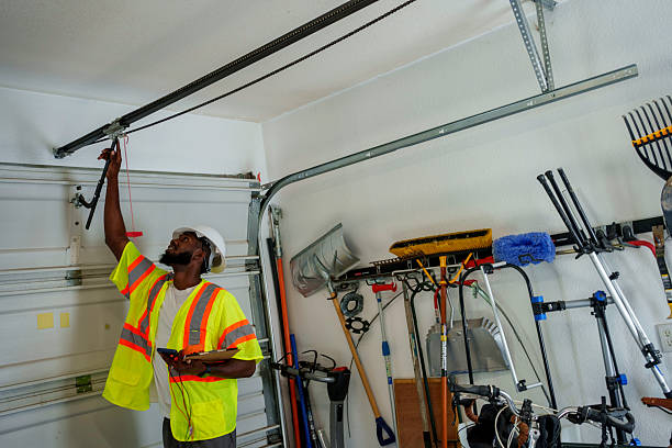 Professional Garage Door Roller Replacement technician working in Rotan, TX